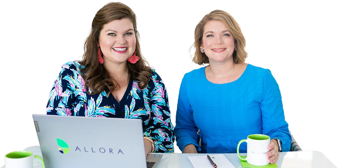 Allora Consultation, showing both founders of Allora smiling and waiting to assist.